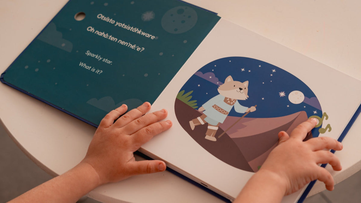Preschooler is reading Cali's Books soundbook in Mohawk