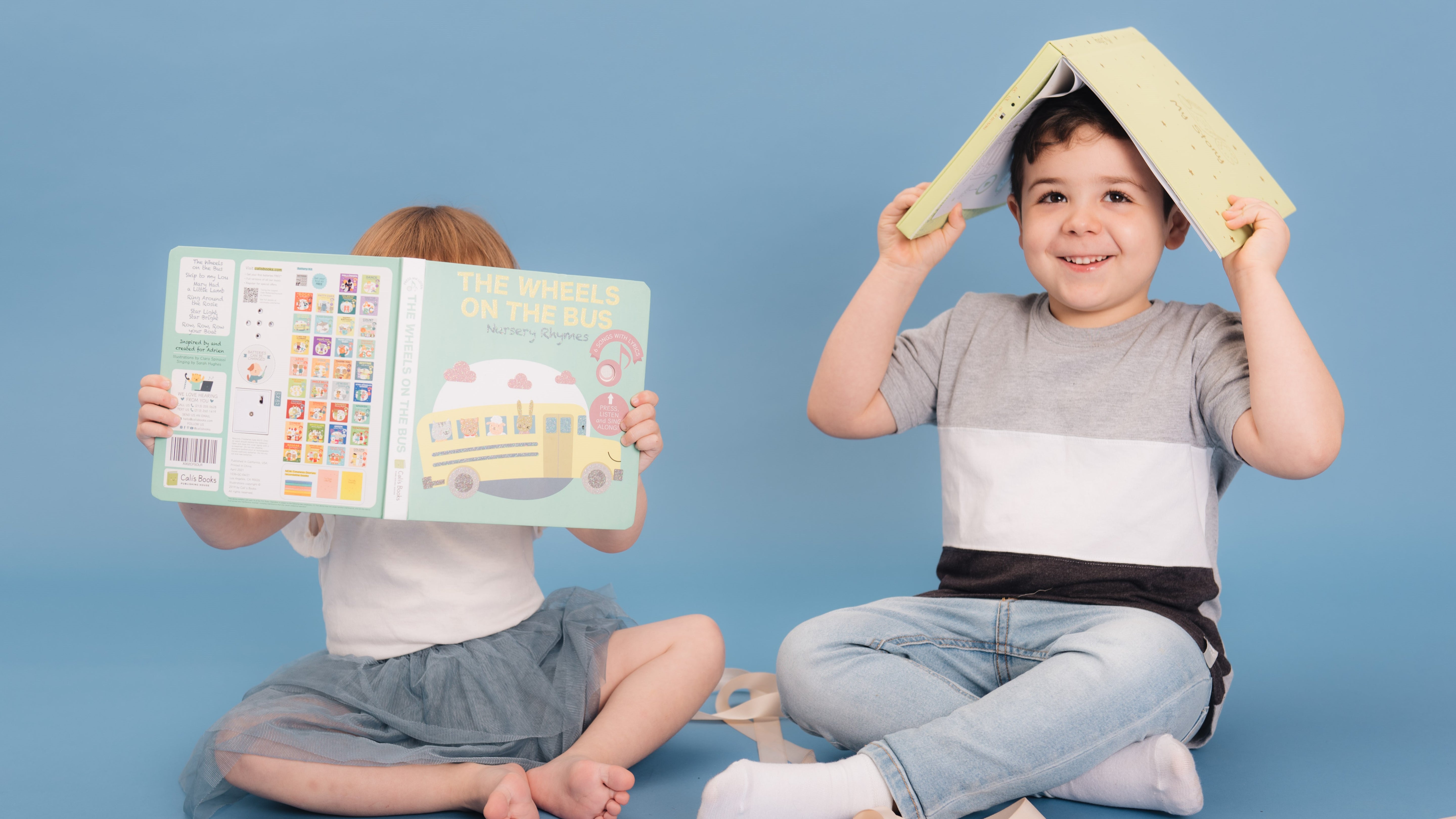 Two kids are reading and playing with books. Fun educational activity, ADHD strategies. 