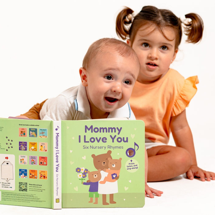 Two toddlers are reading a book. Mothers day, mothers day gift, art and craft, kids gifts.